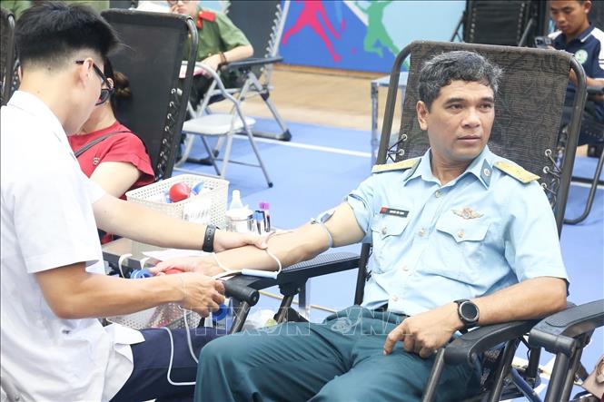  Hoạt động hiến máu tình nguyện lan tỏa tinh thần sẻ chia, trách nhiệm vì cộng đồng. Ảnh: Quốc Lũy - TTXVN