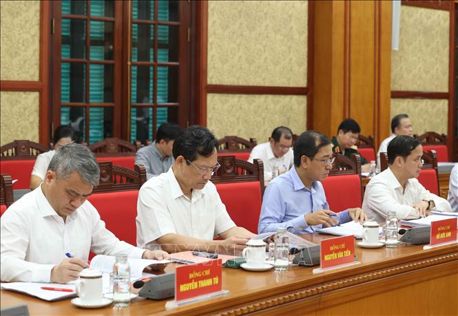 Các đại biểu tham dự buổi làm việc. Ảnh: Thống Nhất – TTXVN