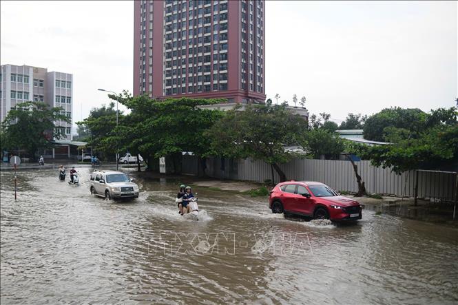 Ngập do triều cường chiều 28/9 trên đường số 15B, phường Tân Mỹ, TP. Hồ Chí Minh. Ảnh: Hồng Đạt - TTXVN