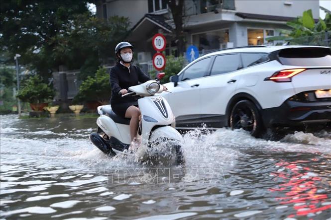 Ngập cục bộ do triều cường trên đường Số 14, phường Tân Hưng, TP. Hồ Chí Minh. Ảnh: Hồng Đạt - TTXVN