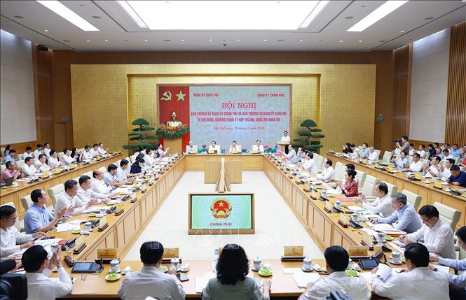 Hội nghị Ban Thường vụ Đảng uỷ Chính phủ và Ban Thường vụ Đảng uỷ Quốc hội. Ảnh: Dương Giang – TTXVN 
