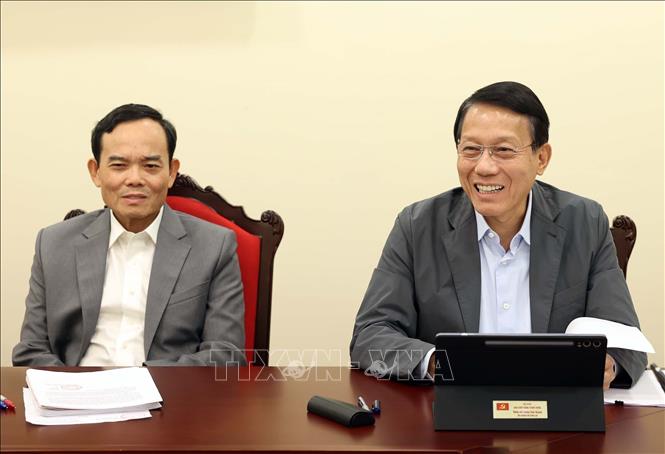 Các đại biểu thảo luận tại tổ. Ảnh: Thống Nhất - TTXVN