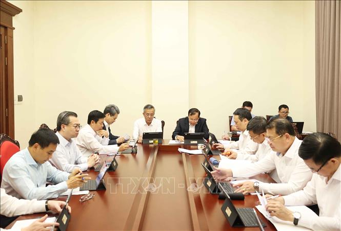Các đại biểu thảo luận tại tổ. Ảnh: Thống Nhất - TTXVN