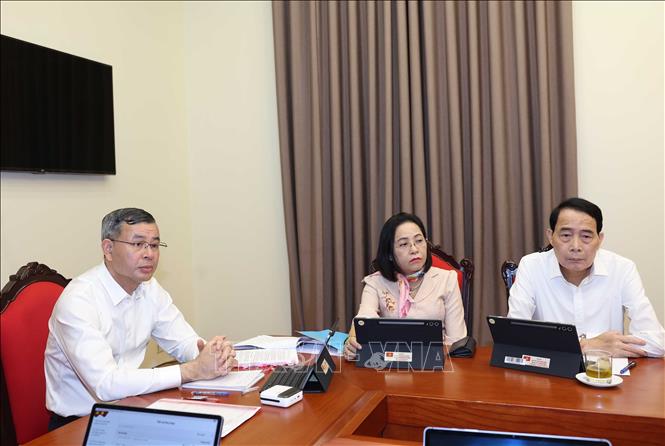 Các đại biểu thảo luận tại tổ. Ảnh: Thống Nhất - TTXVN