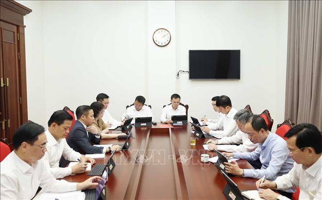 Các đại biểu thảo luận tại tổ. Ảnh: Thống Nhất - TTXVN
