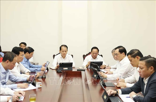 Các đại biểu thảo luận tại tổ. Ảnh: Thống Nhất - TTXVN