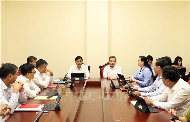 Các đại biểu thảo luận tại tổ. Ảnh: Thống Nhất - TTXVN