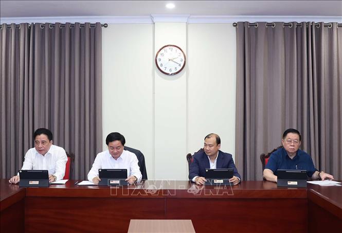 Các đại biểu thảo luận tại tổ. Ảnh: Thống Nhất - TTXVN