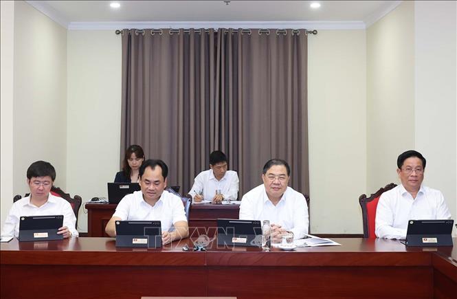 Các đại biểu thảo luận tại tổ. Ảnh: Thống Nhất - TTXVN