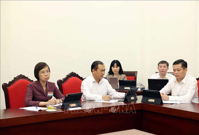 Các đại biểu thảo luận tại tổ. Ảnh: Thống Nhất - TTXVN