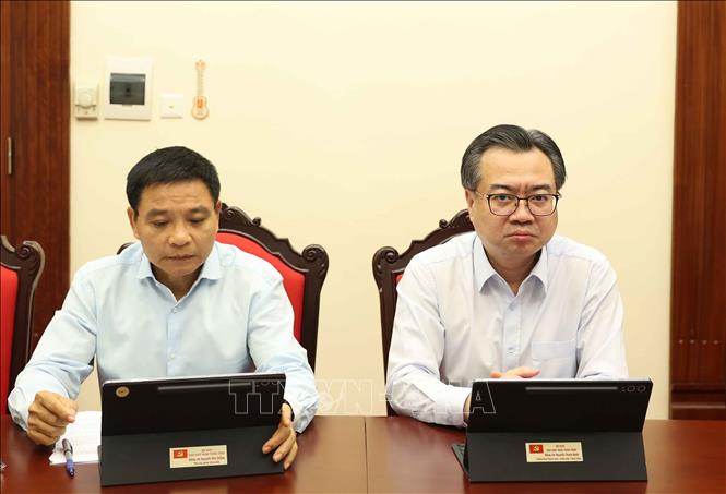 Các đại biểu thảo luận tại tổ. Ảnh: Thống Nhất - TTXVN