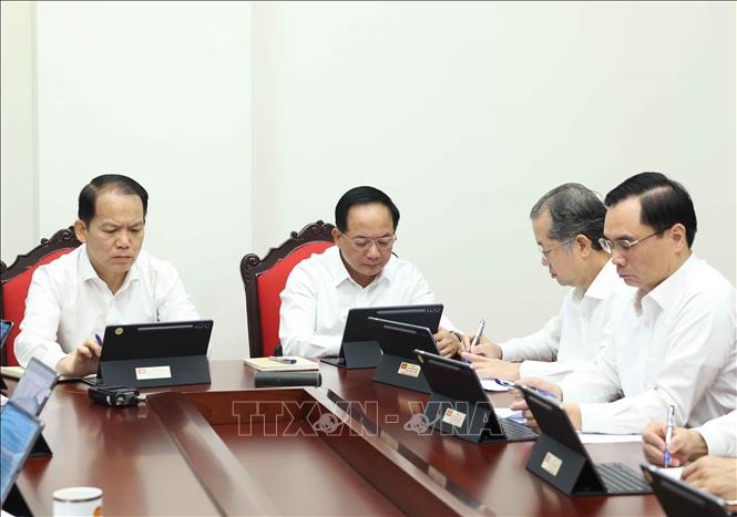 Các đại biểu thảo luận tại tổ. Ảnh: Thống Nhất - TTXVN