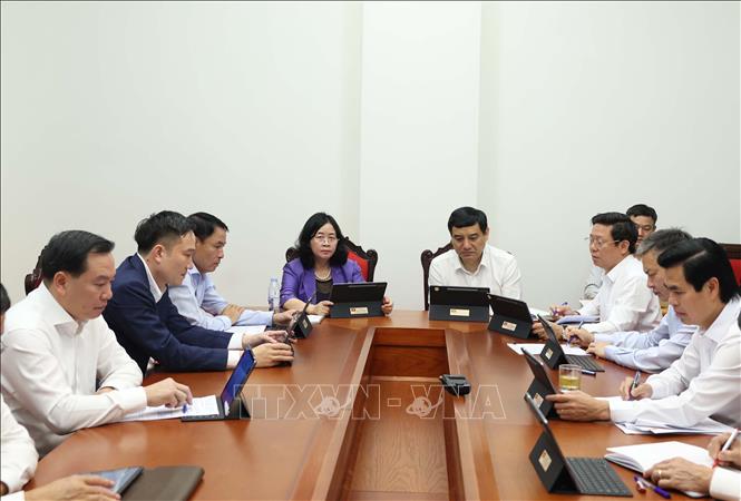 Các đại biểu thảo luận tại tổ. Ảnh: Thống Nhất - TTXVN