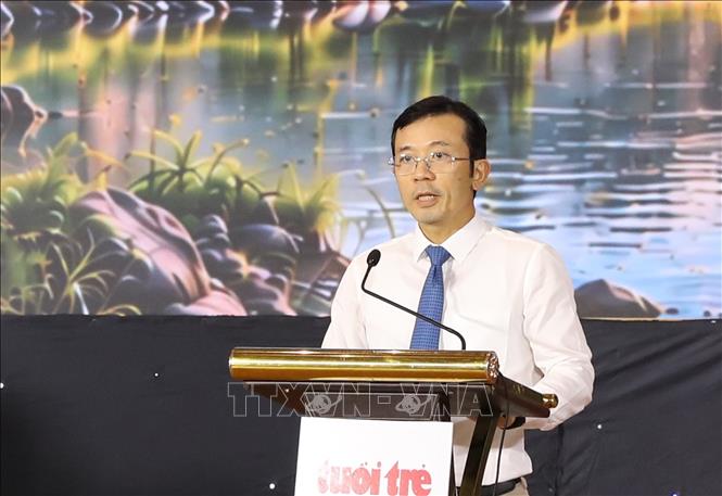 Nhà báo Trần Xuân Toàn, Phó Tổng giám đốc Cơ quan Báo và Phát thanh, Truyền hình Thành phố Hồ Chí Minh, Tổng biên tập Báo điện tử Tuổi Trẻ phát biểu tại chương trình. Ảnh: Đức Phương - TTXVN