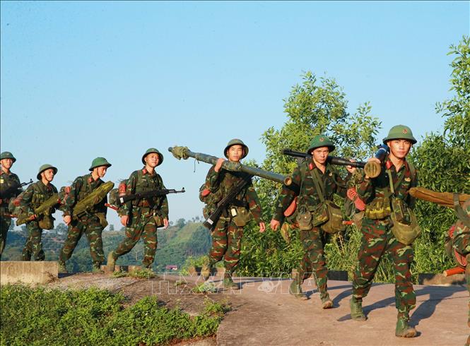 Cán bộ, chiến sĩ Sư đoàn 346 - Đoàn Lam Sơn thực hiện chuyến hành quân dã ngoại theo kế hoạch thường niên của đơn vị. Ảnh: Trọng Đức - TTXVN
