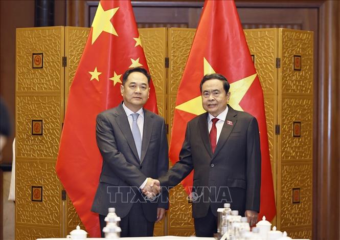 Chủ tịch Quốc hội Trần Thanh Mẫn và Chủ tịch Hội Hữu nghị đối ngoại nhân dân Trung Quốc Dương Vạn Minh. Ảnh: Doãn Tấn – TTXVN