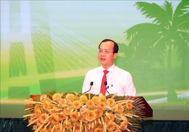 Chủ tịch UBND tỉnh Vĩnh Long Trần Trí Quang phát biểu tại buổi họp mặt. Ảnh: Phạm Minh Tuấn-TTXVN