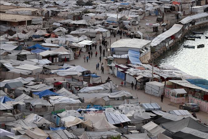Người dân tại trại tị nạn ở Gaza ngày 6/10/2026. Ảnh: THX/TTXVN phát