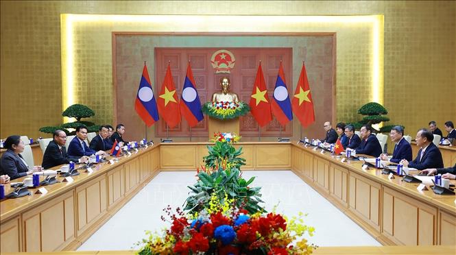 Thủ tướng Lê Minh Hưng hội kiến đồng chí Vilay Lakhamfong, Thường trực Ban Bí thư Trung ương Đảng Nhân dân Cách mạng Lào. Ảnh: Dương Giang – TTXVN
