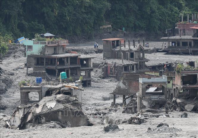 Những ngôi nhà bị phá hủy sau lũ quét tại Bidur, Nepal, ngày 29/8/2026. Ảnh: Yonhap/TTXVN phát