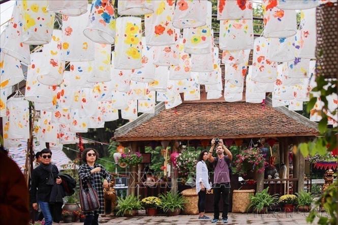 Văn Miếu - Quố Tử Giám là điểm đến của nhiều du khách trong và ngoài nước khi tới Thủ đô. Ảnh: TTXVN