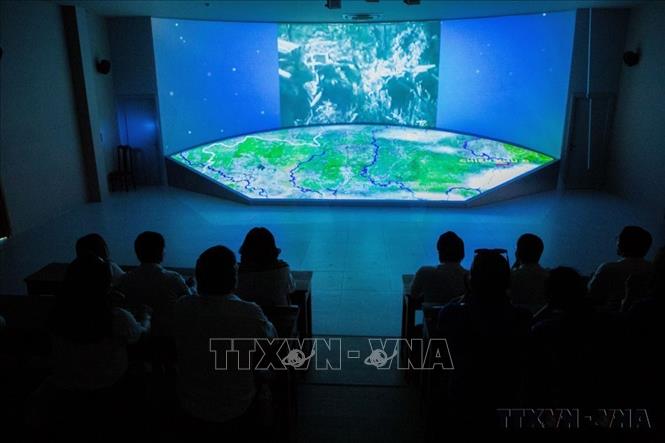 Ứng dụng số hóa bằng công nghệ 3D mapping tại Khu di tích lịch sử văn hóa quốc gia đặc biệt Căn cứ Trung ương Cục miền Nam (Tây Ninh) mang đến trải nghiệm mới mẻ, hấp dẫn. Ảnh: Giang Phương - TTXVN