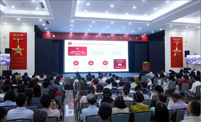 Đảng viên thuộc Đảng bộ Thông tấn xã Việt Nam tham dự Hội nghị trực tuyến tại điểm cầu trụ sở Thông tấn Quốc gia (5 Lý Thường Kiệt, Hà Nội). Ảnh: Phạm Kiên - TTXVN