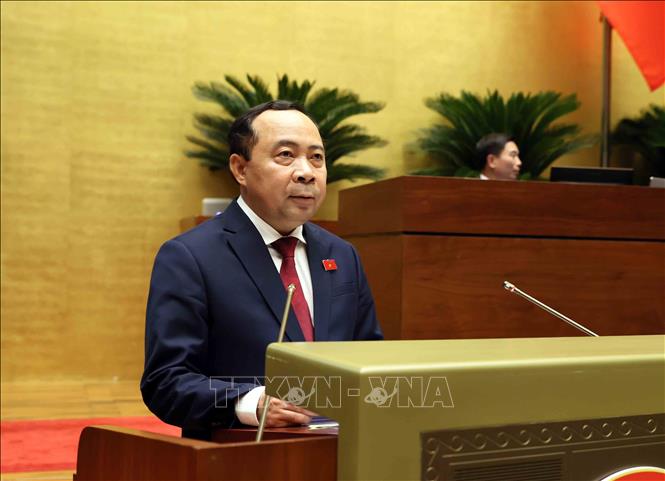 Bộ trưởng Bộ Khoa học và Công nghệ Vũ Hải Quân trình bày tờ trình về 02 dự án Luật: Luật Bưu chính (sửa đổi) và Luật sửa đổi, bổ sung một số điều của Luật Đo lường. Ảnh: An Đăng - TTXVN
