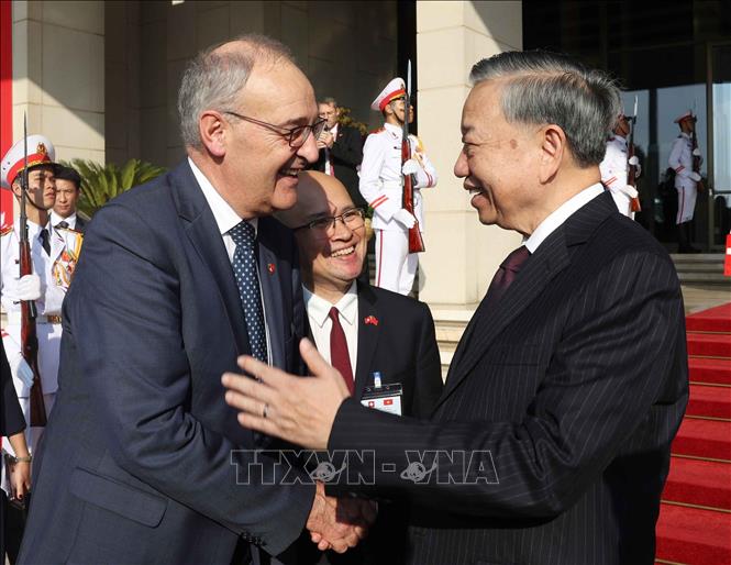 Tổng Bí thư, Chủ tịch nước Tô Lâm và Tổng thống Liên bang Thụy Sĩ Guy Parmelin. Ảnh: Thống Nhất – TTXVN
