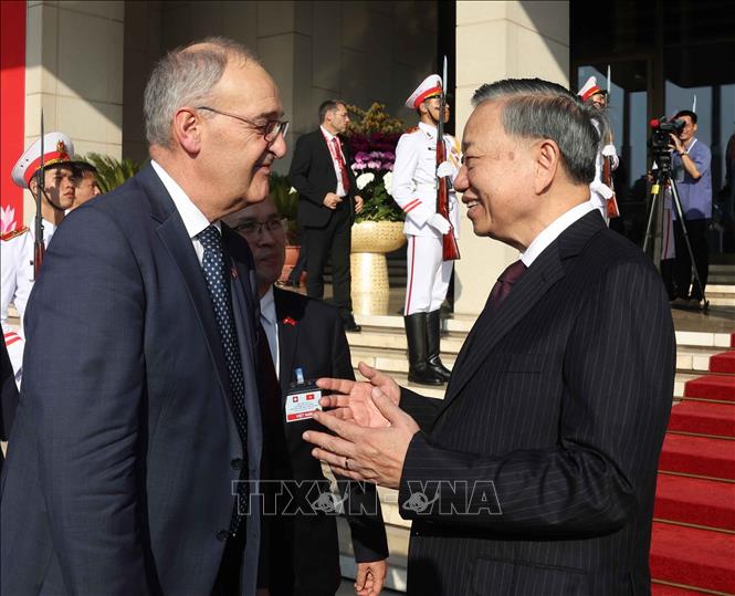 Tổng Bí thư, Chủ tịch nước Tô Lâm và Tổng thống Liên bang Thụy Sĩ Guy Parmelin. Ảnh: Thống Nhất – TTXVN
