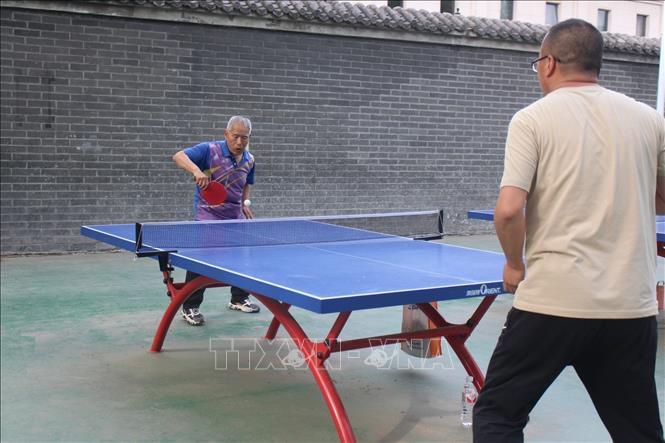 Người cao tuổi Bắc Kinh (Trung Quốc) rèn luyện sức khỏe. Ảnh: Hải Yến - PV TTXVN tại Trung Quốc
