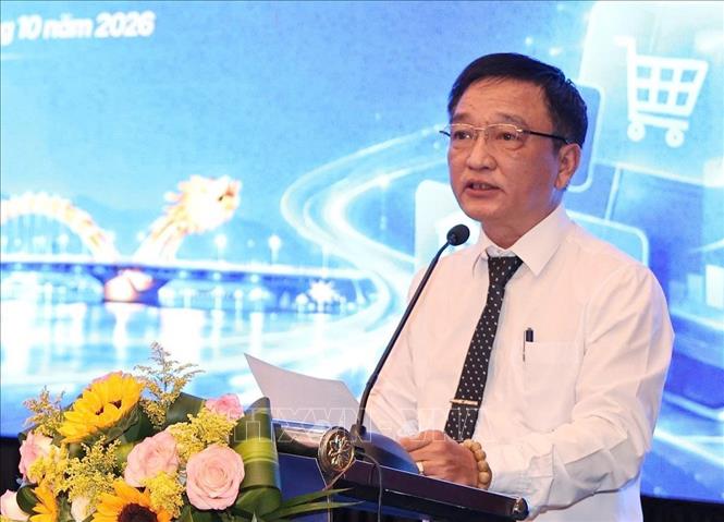 Phó Giám đốc Sở Công thương thành phố Đà Nẵng Huỳnh Xuân Sơn phát biểu khai mạc Hội thảo Thúc đẩy thương mại điện tử và thanh toán số năm 2026. Ảnh: Trần Lê Lâm - TTXVN 