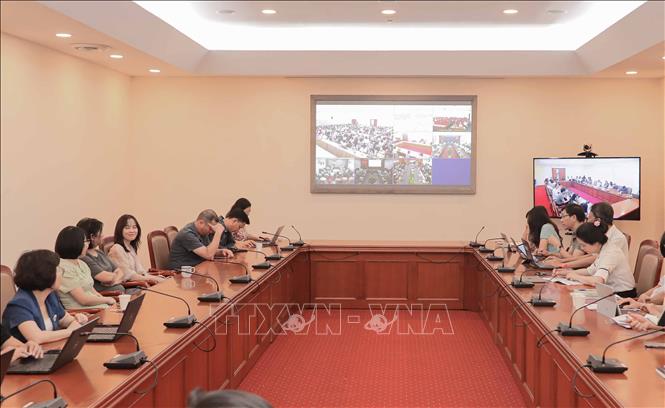 Đảng viên Đảng bộ TTXVN dự hội nghị trực tuyến tại điểm cầu trụ sở Thông tấn quốc gia (số 5, Lý Thường Kiệt). Ảnh: Phan Phương - TTXVN