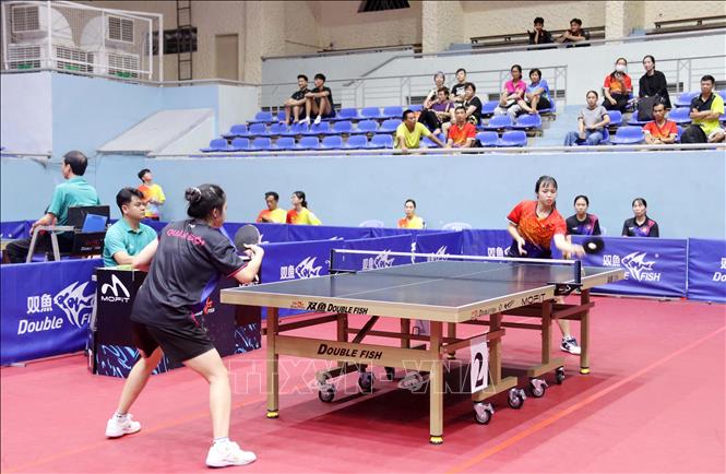 Trận đấu vòng loại đồng đội nam và đồng đội nữ sau lễ khai mạc. Ảnh: Hoài Thu – TTXVN