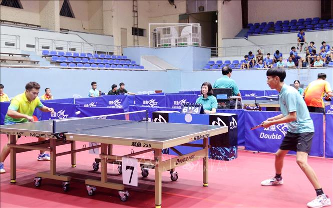 Trận đấu vòng loại đồng đội nam và đồng đội nữ sau lễ khai mạc. Ảnh: Hoài Thu – TTXVN