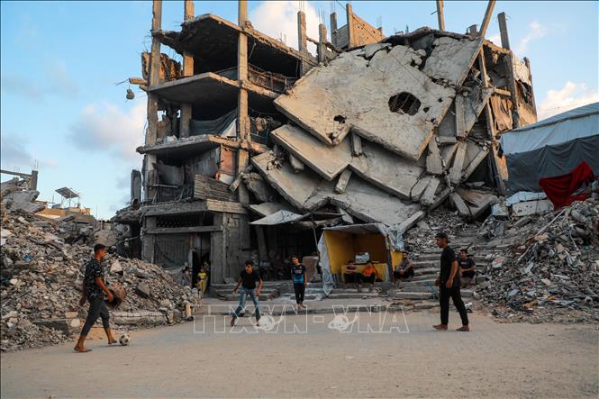 Tòa nhà bị phá hủy do xung đột tại Dải Gaza. Ảnh: THX/TTXVN phát