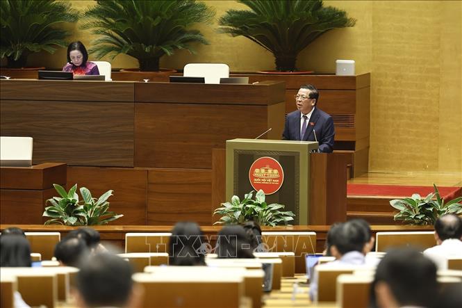Bộ trưởng Bộ Xây dựng Trần Hồng Minh phát biểu giải trình, làm rõ một số vấn đề đại biểu Quốc hội nêu. Ảnh: Doãn Tấn – TTXVN
