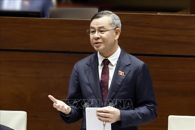 Bộ trưởng Bộ Tài chính Ngô Văn Tuấn phát biểu giải trình, làm rõ một số vấn đề đại biểu Quốc hội nêu. Ảnh: Doãn Tấn – TTXVN