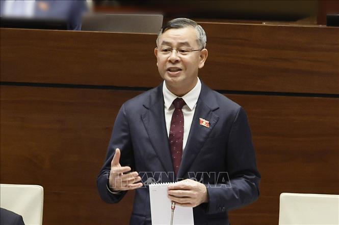 Bộ trưởng Bộ Tài chính Ngô Văn Tuấn phát biểu giải trình, làm rõ một số vấn đề đại biểu Quốc hội nêu. Ảnh: Doãn Tấn – TTXVN